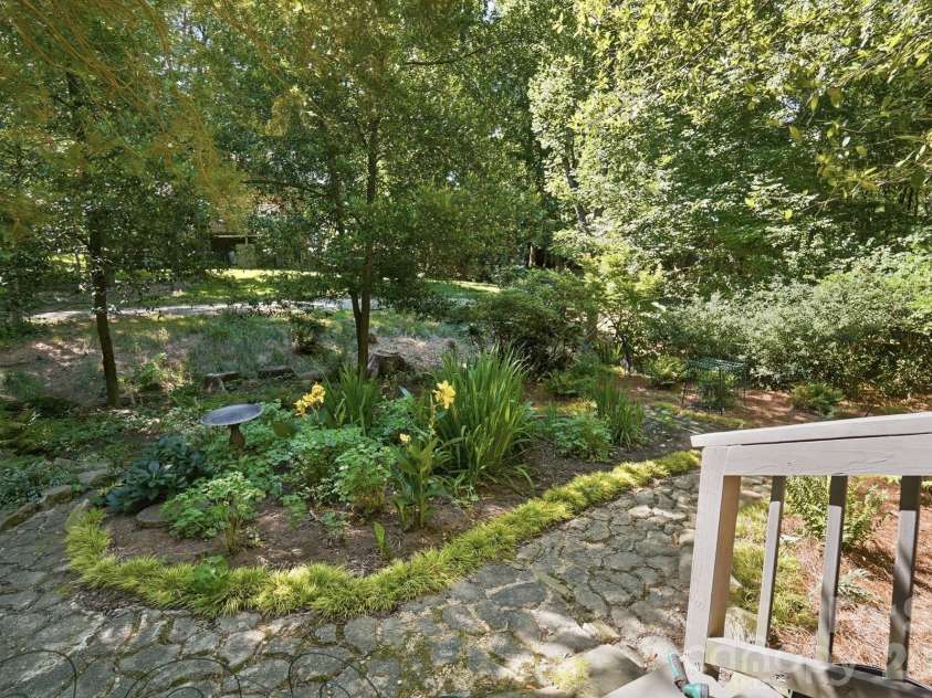 723 Walnut Point Drive, Matthews, NC 28105.  MLS# CAR4391716, YatesRealty ID 33345. Garden Bed in Backyard