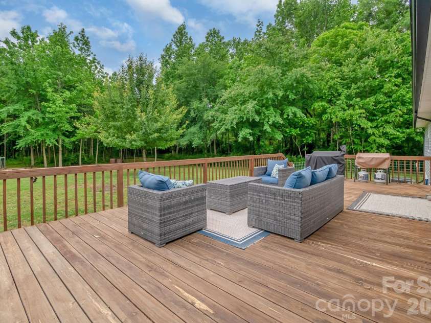 7209 Landsford Road, Monroe, NC 28112.  MLS# CAR4396350, YatesRealty ID 33353. Back deck enjoyment