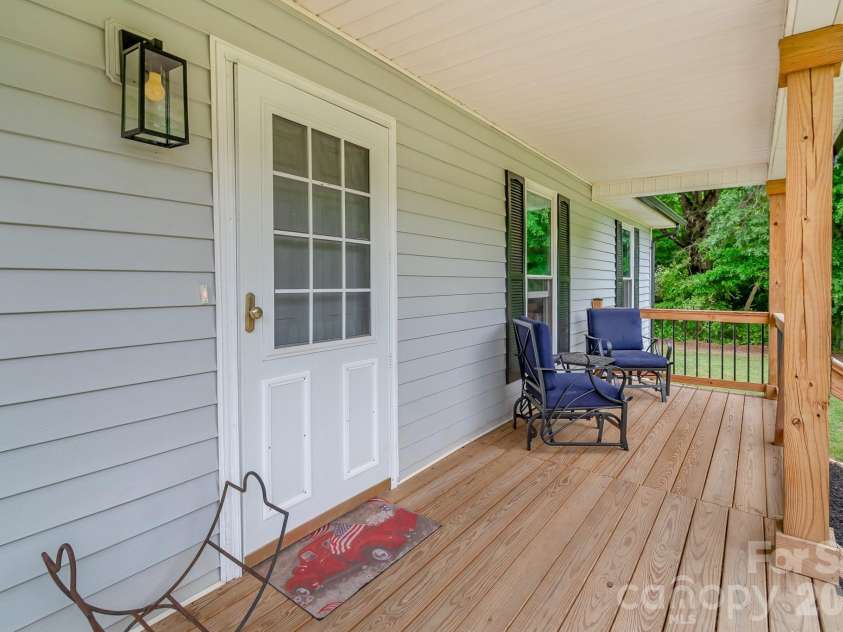 7209 Landsford Road, Monroe, NC 28112.  MLS# CAR4396350, YatesRealty ID 33353. Front porch relaxing