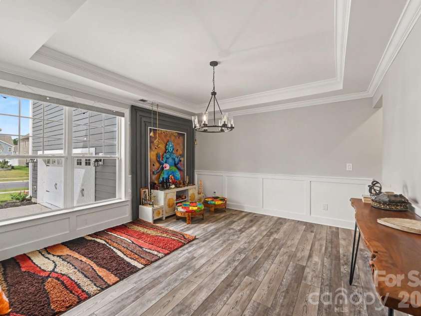 3025 Haley Circle, Davidson, NC 28036.  MLS# CAR4397162, YatesRealty ID 33358. Downstairs space for office, dining room, flex