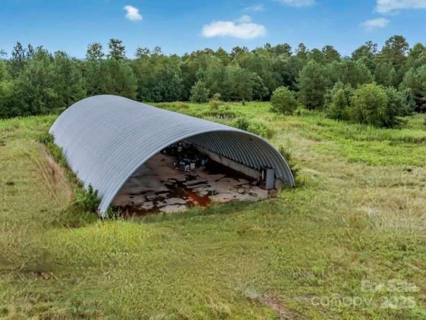 112 Gene Mcgaha Lane, Mooresboro, NC 28114.  MLS# CAR4276024, YatesRealty ID 33363. 48 x 100 Quonset Hut