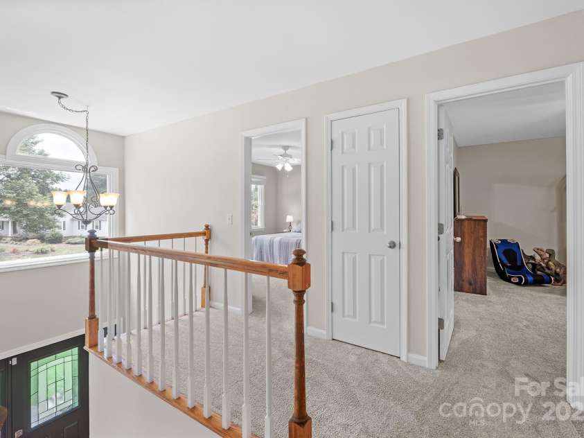 13118 Willow Breeze Lane, Huntersville, NC 28078.  MLS# CAR4291131, YatesRealty ID 33366. Upstairs hallway