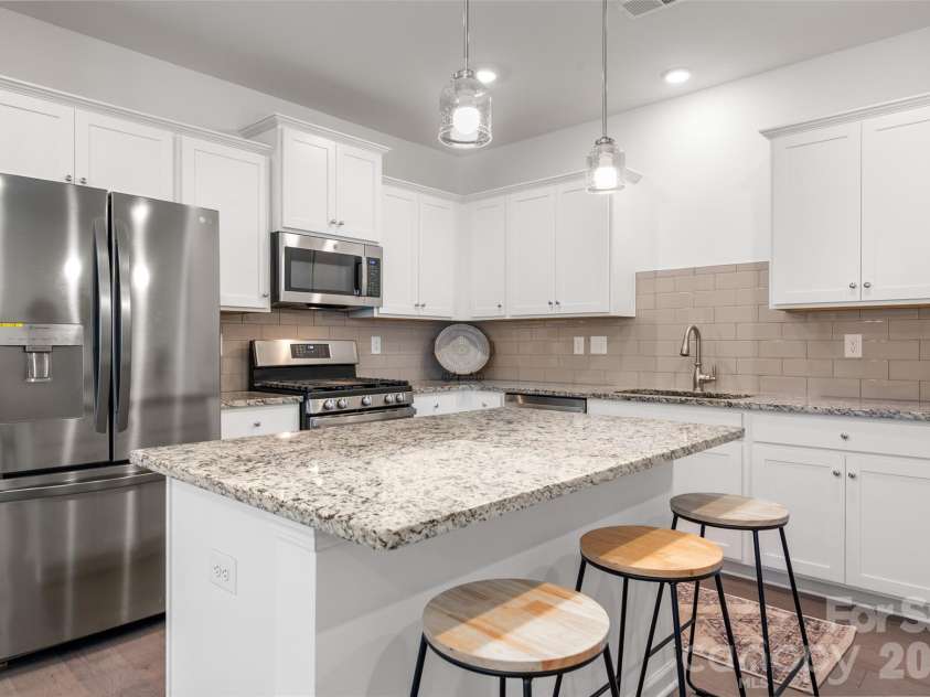 215 Harpers Run Lane, Matthews, NC 28104.  MLS# CAR4336514, YatesRealty ID 33366. 