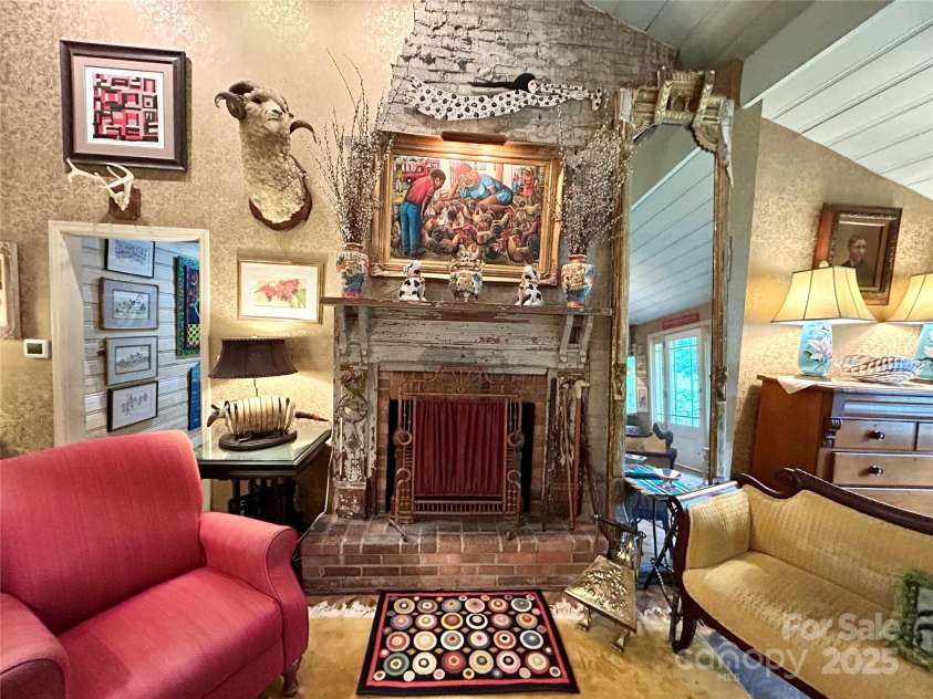 100 Ivy Hill Lane, Tryon, NC 28782.  MLS# CAR4273612, YatesRealty ID 33368. Fireplace