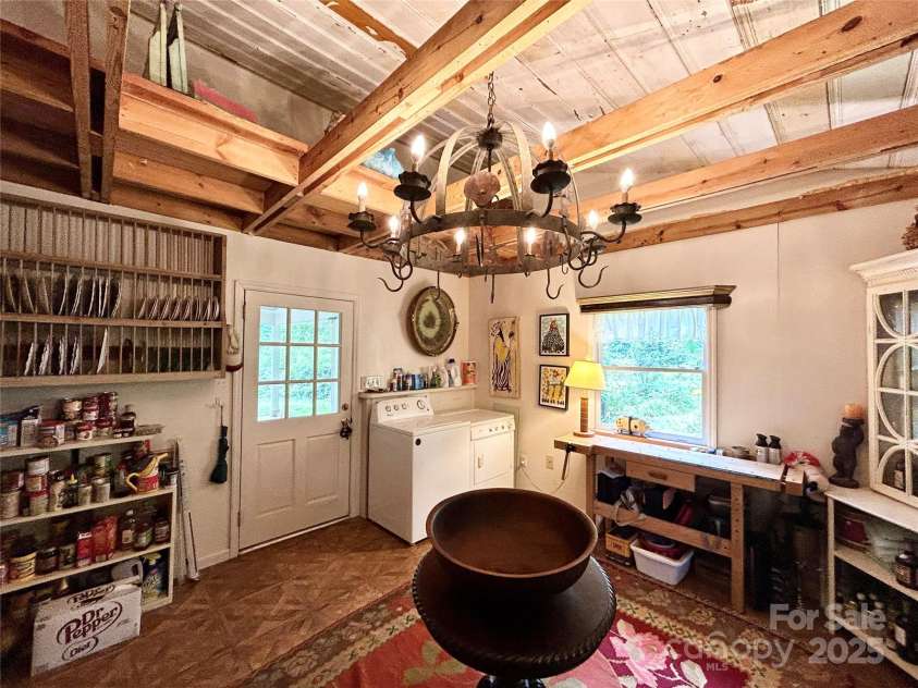 100 Ivy Hill Lane, Tryon, NC 28782.  MLS# CAR4273612, YatesRealty ID 33368. Laundry