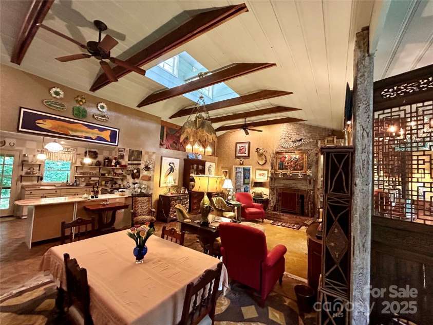 100 Ivy Hill Lane, Tryon, NC 28782.  MLS# CAR4273612, YatesRealty ID 33368. Living Room Dining room