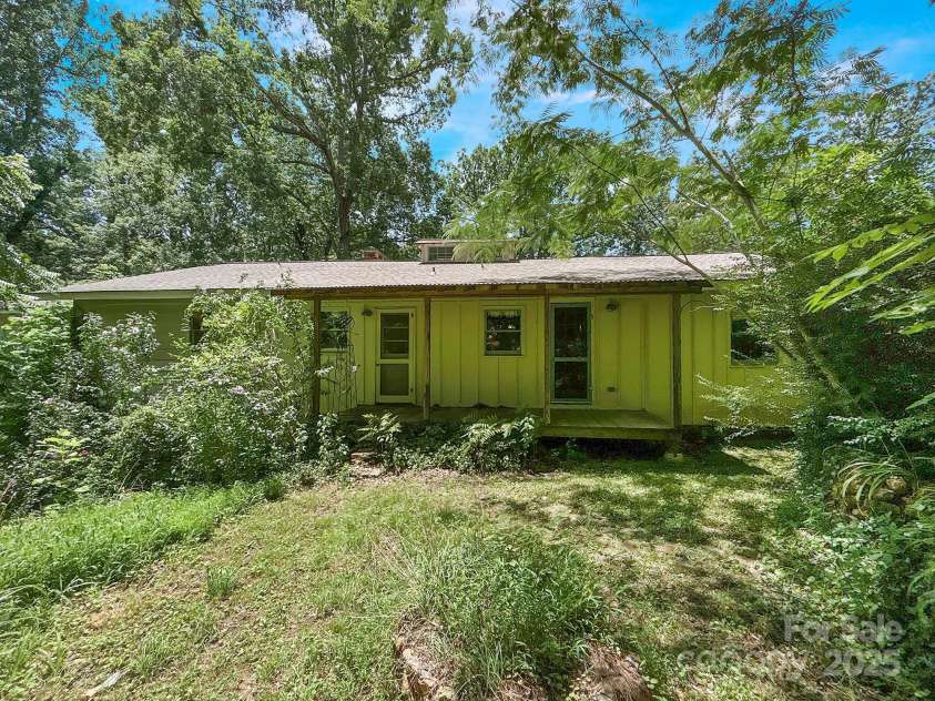 100 Ivy Hill Lane, Tryon, NC 28782.  MLS# CAR4273612, YatesRealty ID 33368. Rear