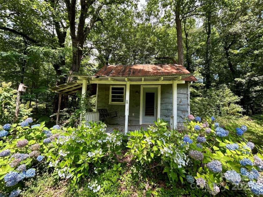 100 Ivy Hill Lane, Tryon, NC 28782.  MLS# CAR4273612, YatesRealty ID 33368. Shed Front