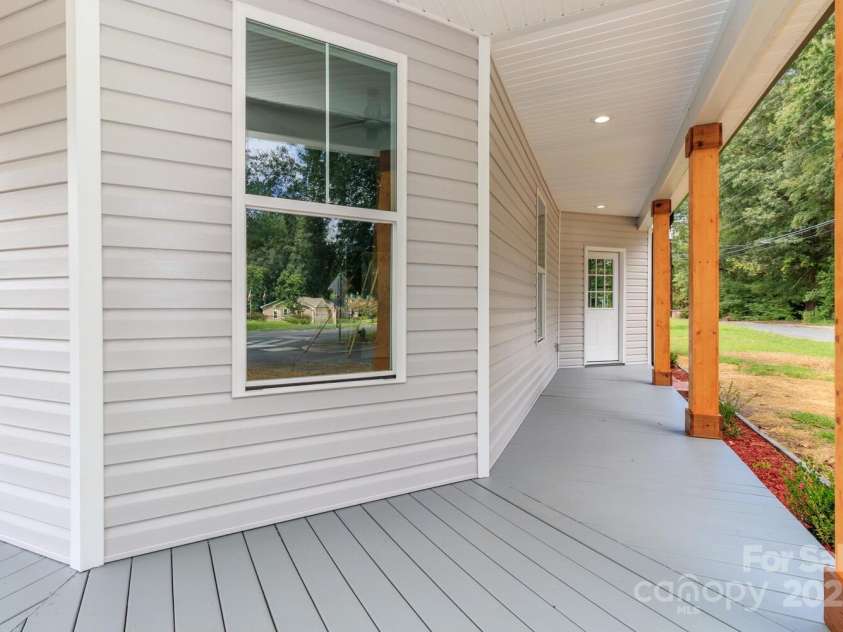 309 Ross Street, Marshville, NC 28103.  MLS# CAR4285303, YatesRealty ID 33369. Wrap-around Porch