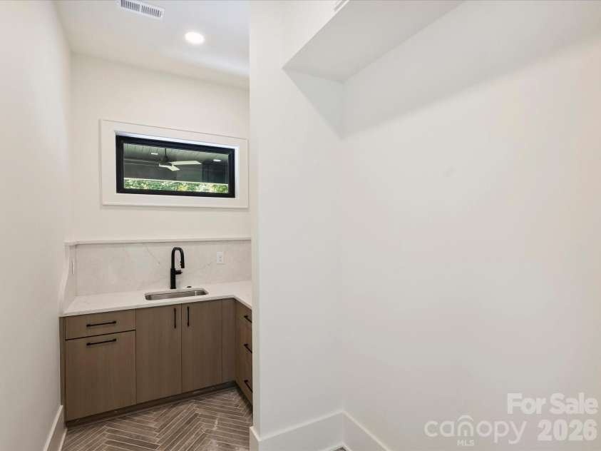 927 Laurel Creek Lane, Charlotte, NC 28211.  MLS# CAR4370623, YatesRealty ID 33369. Scullery with pantry