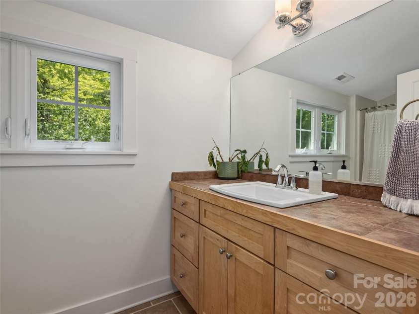 11 Knotty Alder Court, Candler, NC 28715.  MLS# CAR4378917, YatesRealty ID 33370. Bath on upper level