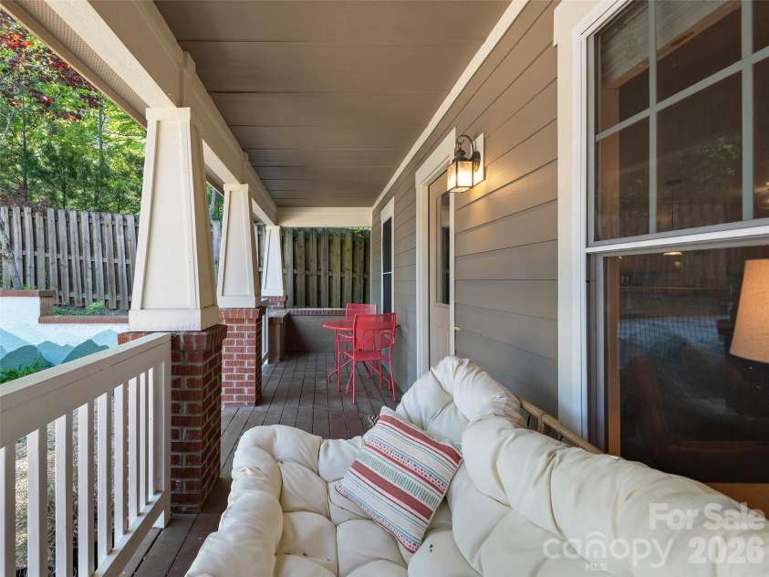 11 Knotty Alder Court, Candler, NC 28715.  MLS# CAR4378917, YatesRealty ID 33370. Covered front porch