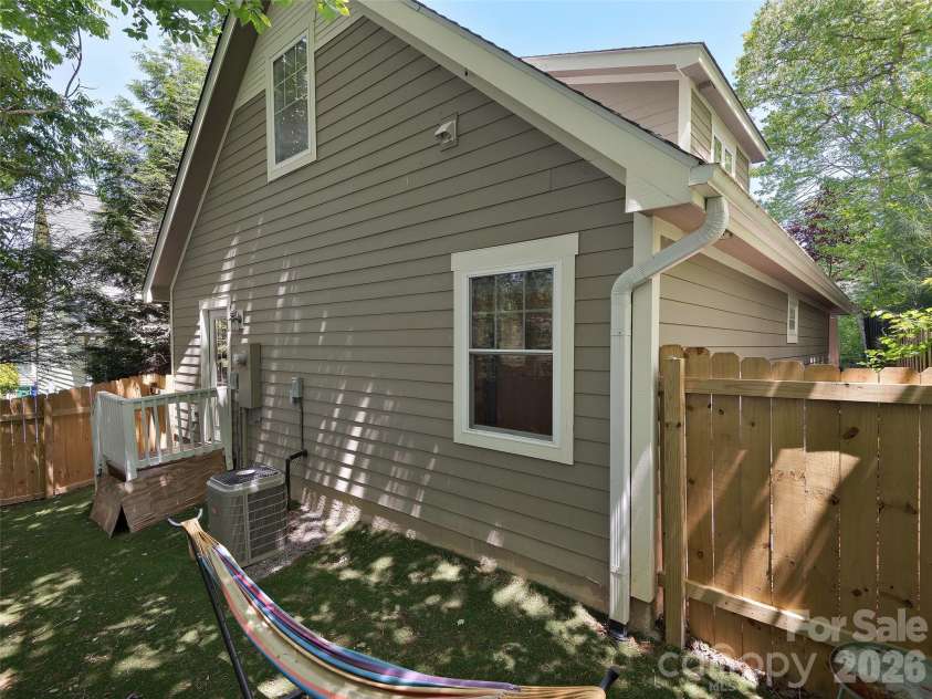 11 Knotty Alder Court, Candler, NC 28715.  MLS# CAR4378917, YatesRealty ID 33370. No mowing required in this private back yard with artificial turf