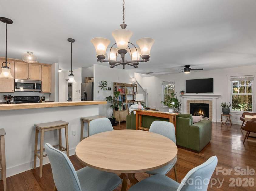 11 Knotty Alder Court, Candler, NC 28715.  MLS# CAR4378917, YatesRealty ID 33370. Open floor plan view from dining area