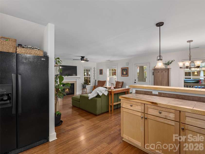 11 Knotty Alder Court, Candler, NC 28715.  MLS# CAR4378917, YatesRealty ID 33370. Open floor plan view from kitchen
