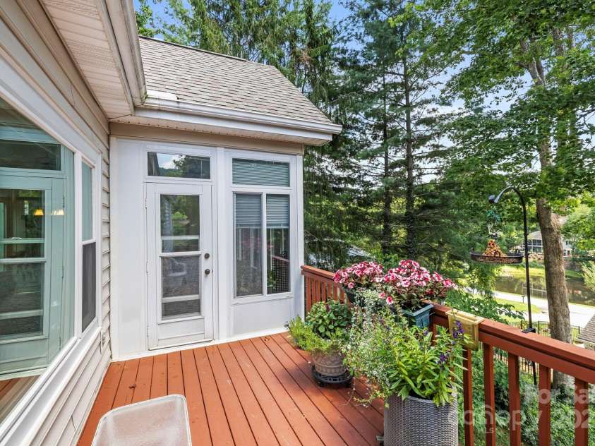 3000 Middleton Way Court, Hendersonville, NC 28791.  MLS# CAR4285309, YatesRealty ID 33374. Deck with partial pond view!