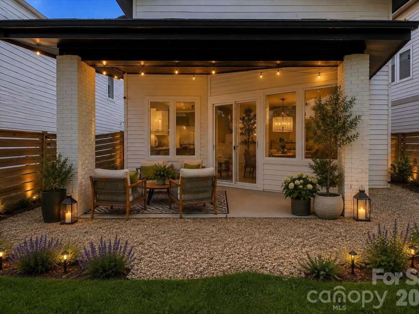 3116 Creighton Drive, Charlotte, NC 28205.  MLS# CAR4382837, YatesRealty ID 33374. AI-Generated Concept – Rendering illustrates the backyard’s potential for enhanced outdoor living
