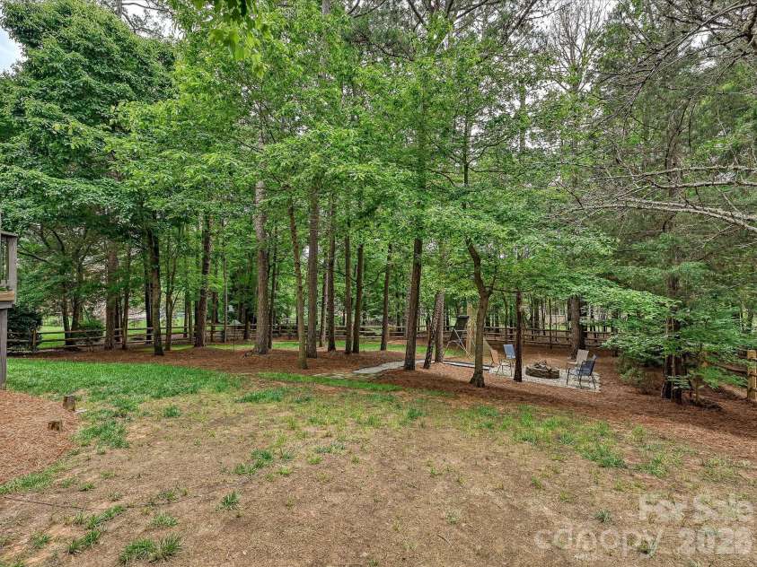 7513 Meadowgate Lane, Waxhaw, NC 28173.  MLS# CAR4386357, YatesRealty ID 33375. Backyard