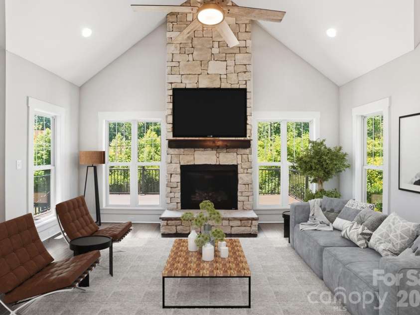 740 Seldon Drive, Charlotte, NC 28216.  MLS# CAR4389074, YatesRealty ID 33378. Great Room with Stone Face FireplaceVirtually Staged