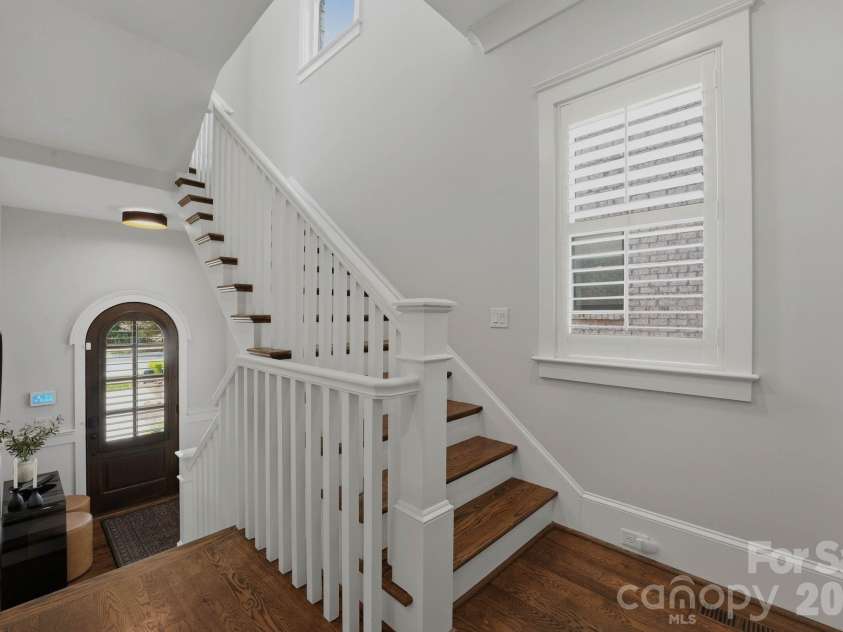 812 Ideal Way, Charlotte, NC 28203.  MLS# CAR4389056, YatesRealty ID 33380. Foyer and stairway to the second level.