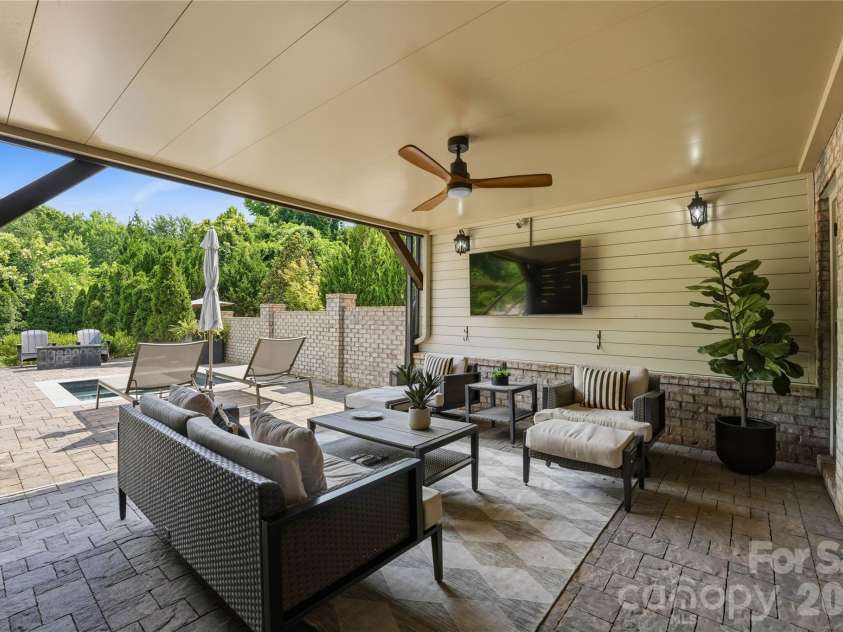812 Ideal Way, Charlotte, NC 28203.  MLS# CAR4389056, YatesRealty ID 33380. Lower-level covered patio.