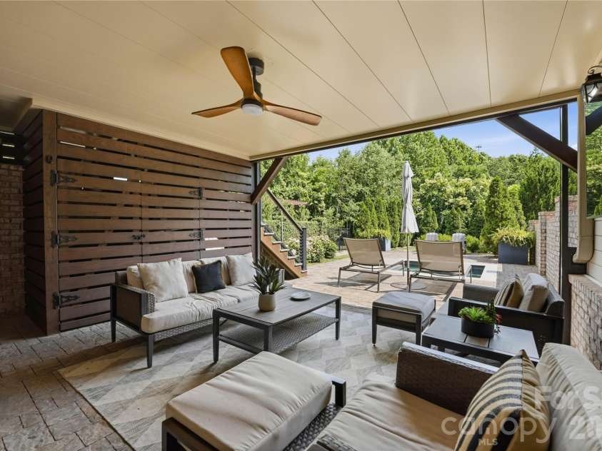 812 Ideal Way, Charlotte, NC 28203.  MLS# CAR4389056, YatesRealty ID 33380. Lower-level covered patio.