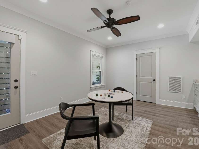 812 Ideal Way, Charlotte, NC 28203.  MLS# CAR4389056, YatesRealty ID 33380. Lower-level living room.