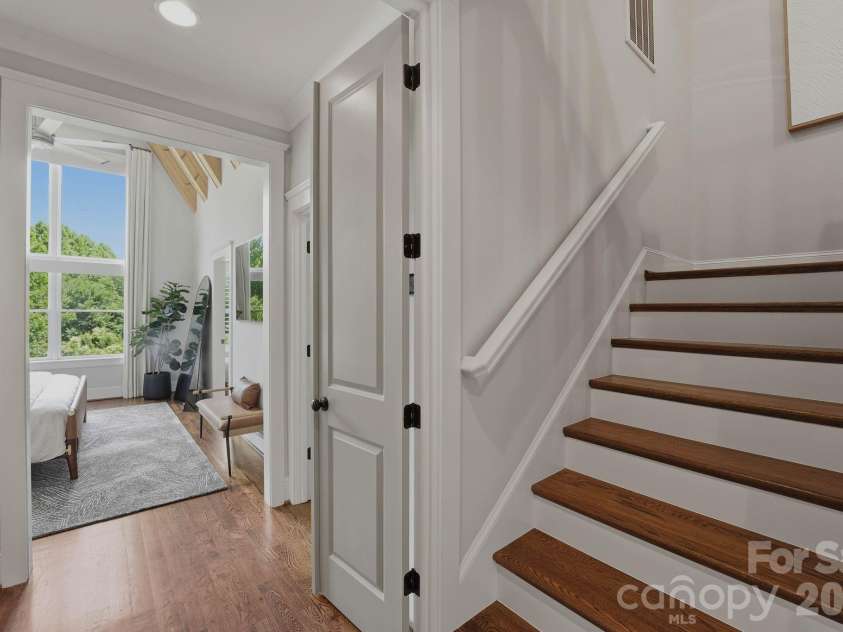 812 Ideal Way, Charlotte, NC 28203.  MLS# CAR4389056, YatesRealty ID 33380. Stairway to the third level.