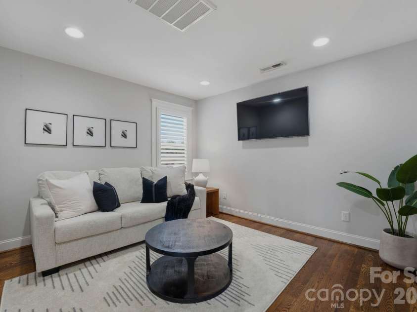 812 Ideal Way, Charlotte, NC 28203.  MLS# CAR4389056, YatesRealty ID 33380. Third-story living room.