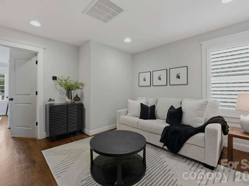 812 Ideal Way, Charlotte, NC 28203.  MLS# CAR4389056, YatesRealty ID 33380. Third-story living room.