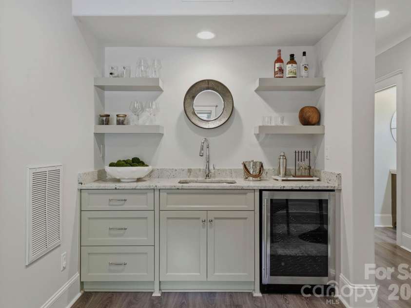 812 Ideal Way, Charlotte, NC 28203.  MLS# CAR4389056, YatesRealty ID 33380. Wet bar in the lower-level living room.