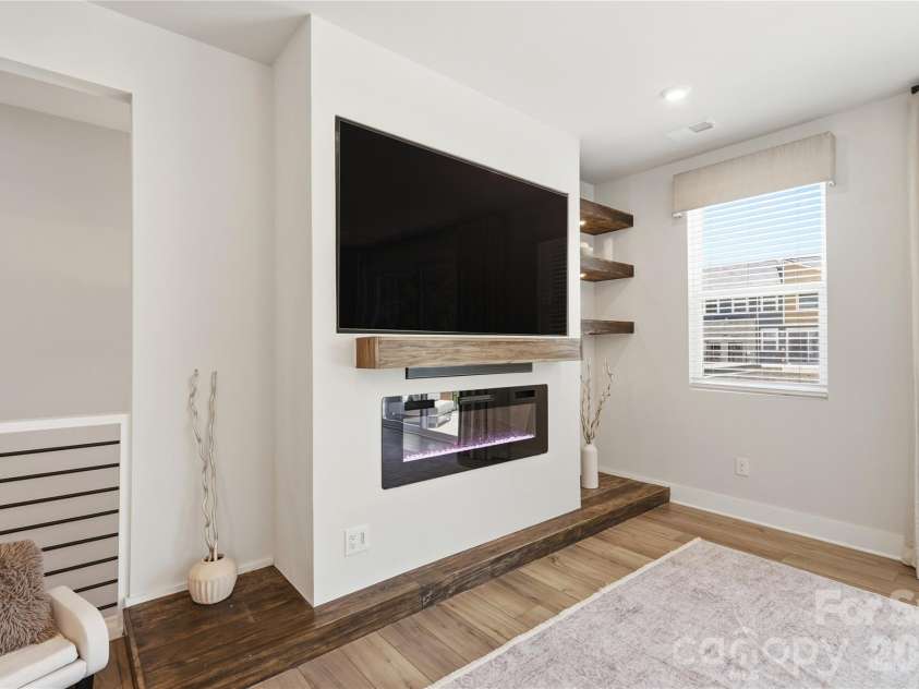 3324 Treble Court, Charlotte, NC 28262.  MLS# CAR4390878, YatesRealty ID 33382. Custom wall unit with fireplace [2023]