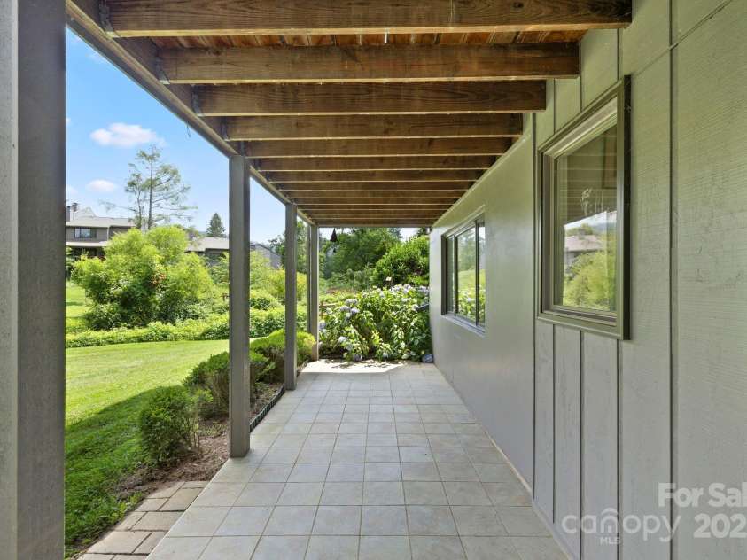 700 Crowfields Lane, Asheville, NC 28803.  MLS# CAR4270656, YatesRealty ID 33387. Covered Lower Walkout Porch also!