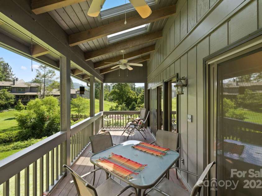 700 Crowfields Lane, Asheville, NC 28803.  MLS# CAR4270656, YatesRealty ID 33387. Wonderful Covered Deck to Enjoy View! Complete with Skylights!!