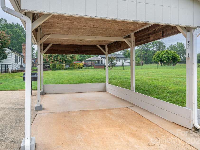 3501 Gardner Park Drive, Gastonia, NC 28054.  MLS# CAR4287459, YatesRealty ID 33390. Carport