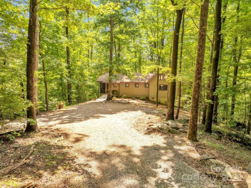 1220 Skyuka Mountain Road, Columbus, NC 28722.  MLS# CAR4288276, YatesRealty ID 33391. Arrive at Cabin!