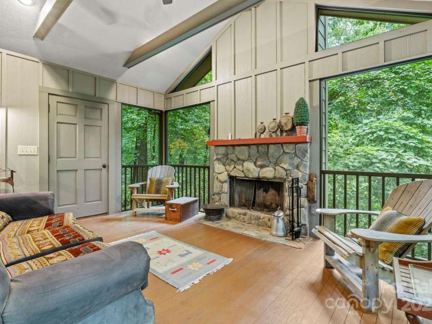 1220 Skyuka Mountain Road, Columbus, NC 28722.  MLS# CAR4288276, YatesRealty ID 33391. Screened in Porch w/FP!