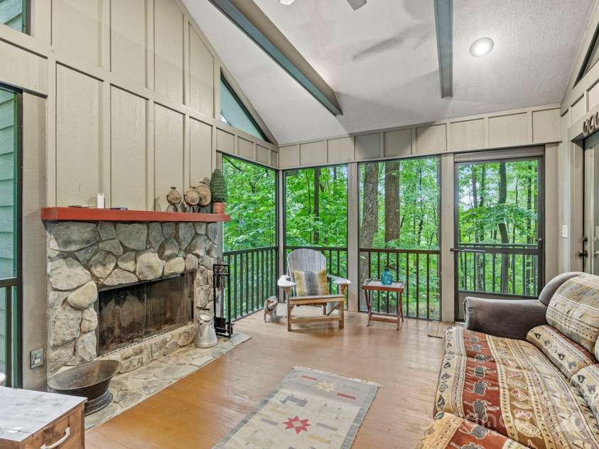 1220 Skyuka Mountain Road, Columbus, NC 28722.  MLS# CAR4288276, YatesRealty ID 33391. Screened in Porch w/FP!