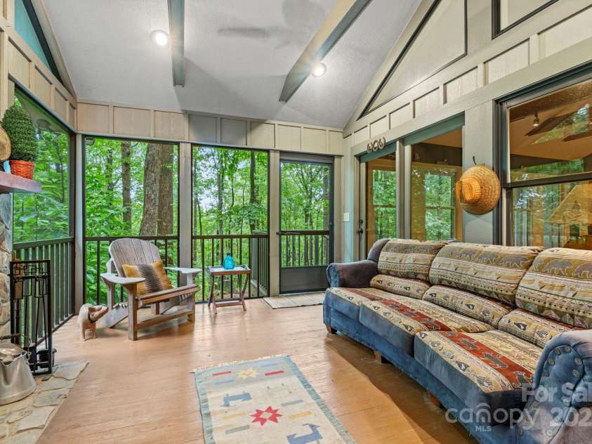 1220 Skyuka Mountain Road, Columbus, NC 28722.  MLS# CAR4288276, YatesRealty ID 33391. Screened in Porch w/FP!