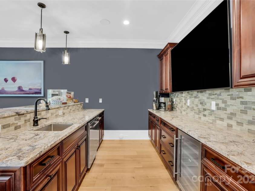 1430 Rosehill Drive, Waxhaw, NC 28173.  MLS# CAR4274652, YatesRealty ID 33396. Basement Kitchenette, dishwassher and full size refrigerator