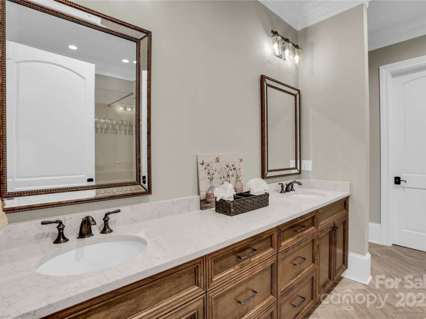 1430 Rosehill Drive, Waxhaw, NC 28173.  MLS# CAR4274652, YatesRealty ID 33396. Dual sinks in main floor guestt