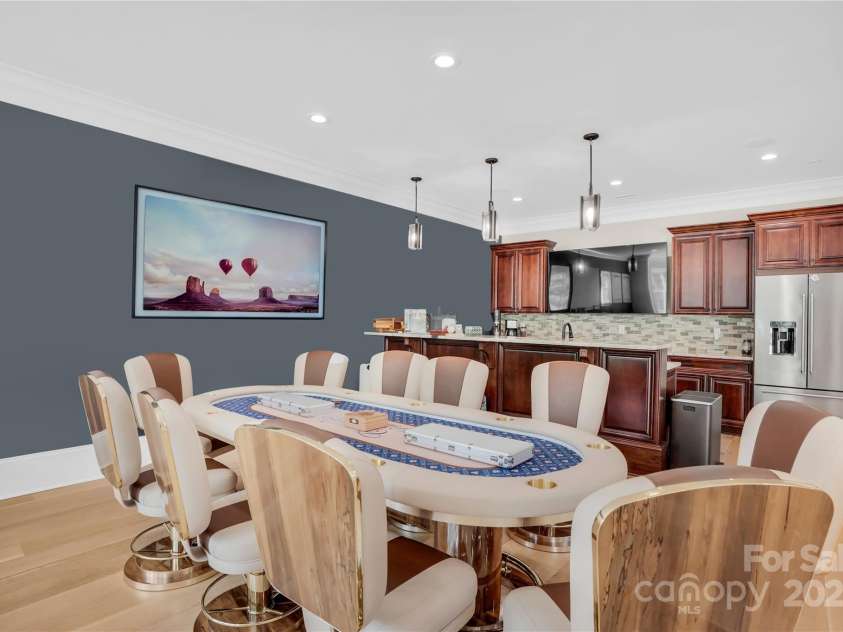 1430 Rosehill Drive, Waxhaw, NC 28173.  MLS# CAR4274652, YatesRealty ID 33396. Game table area in basement