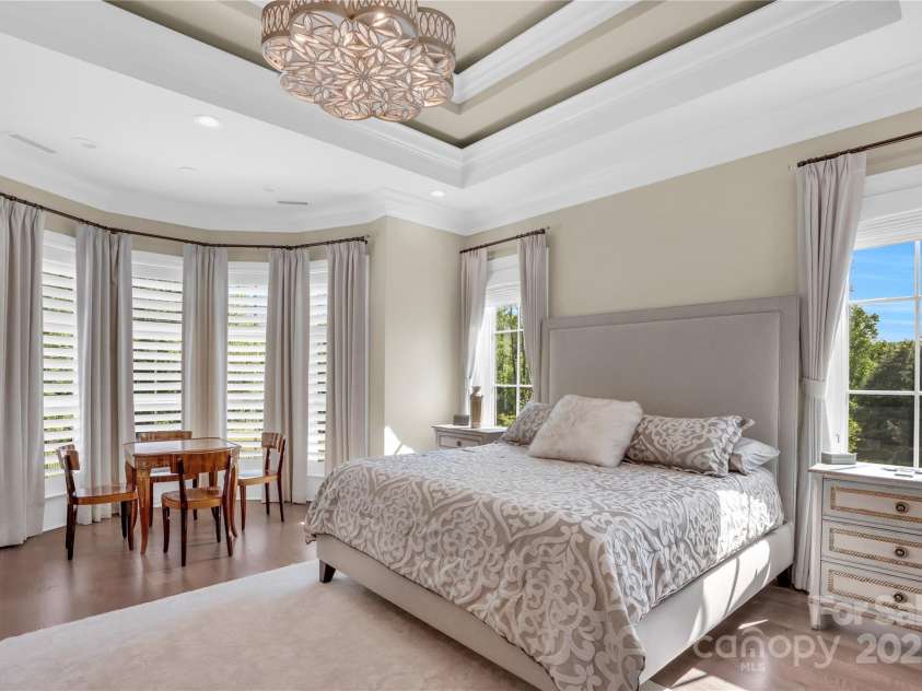 1430 Rosehill Drive, Waxhaw, NC 28173.  MLS# CAR4274652, YatesRealty ID 33396. Main floor Primary Bedroom with tray ceilings and bay windosw.