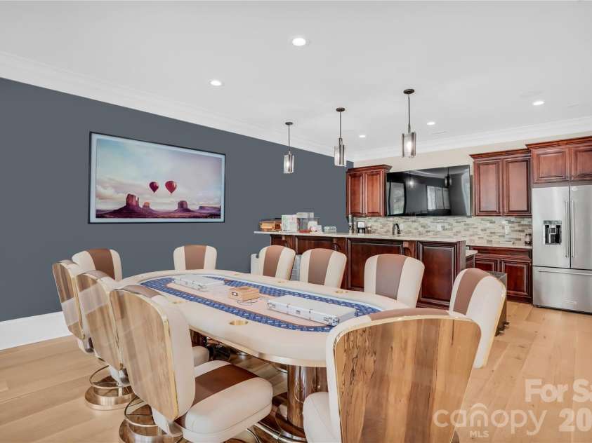 1430 Rosehill Drive, Waxhaw, NC 28173.  MLS# CAR4341859, YatesRealty ID 33396. Basement Game table set up