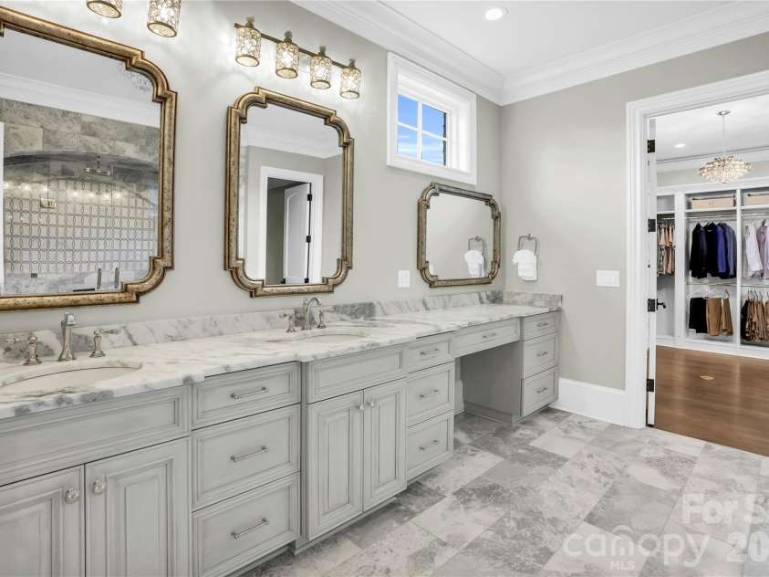 1430 Rosehill Drive, Waxhaw, NC 28173.  MLS# CAR4341859, YatesRealty ID 33396. Elegant double sinks in Primary bathroom with vanity area