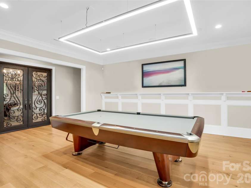 1430 Rosehill Drive, Waxhaw, NC 28173.  MLS# CAR4341859, YatesRealty ID 33396. Pool Table room overlooking Wine Cellar