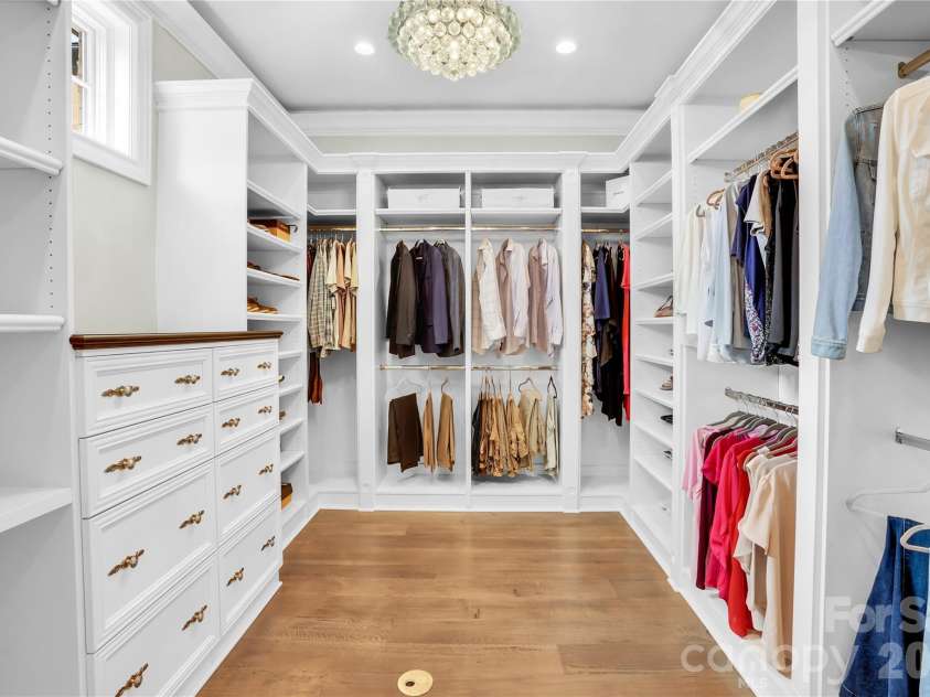 1430 Rosehill Drive, Waxhaw, NC 28173.  MLS# CAR4341859, YatesRealty ID 33396. The immense Primary closet is professionally laid out and has its own washer and dryer hookups