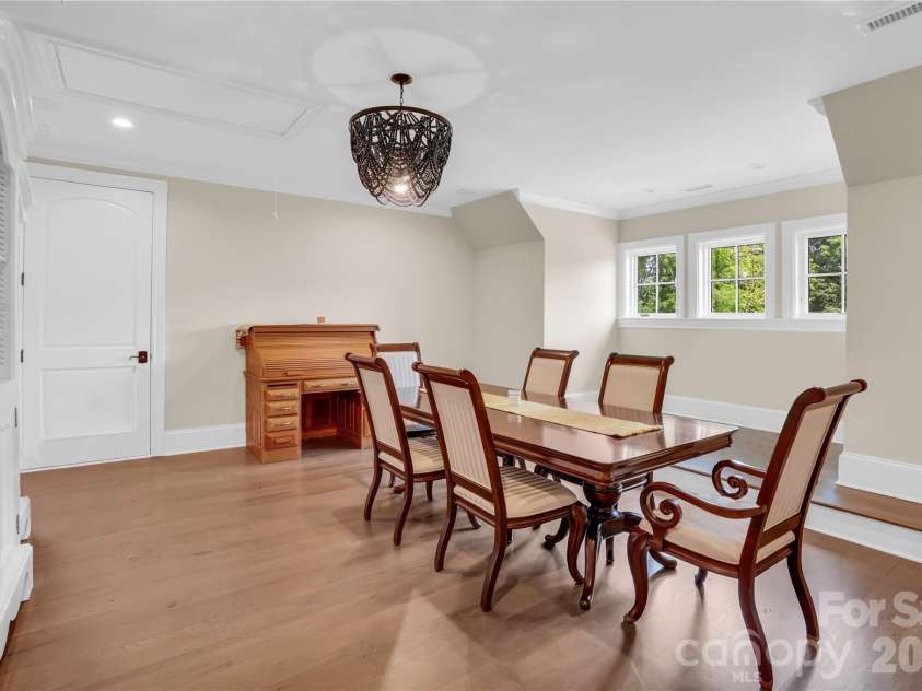 1430 Rosehill Drive, Waxhaw, NC 28173.  MLS# CAR4341859, YatesRealty ID 33396. Upstairs Flex room, being used for crafts. and games. Walk-in attic storage off the room