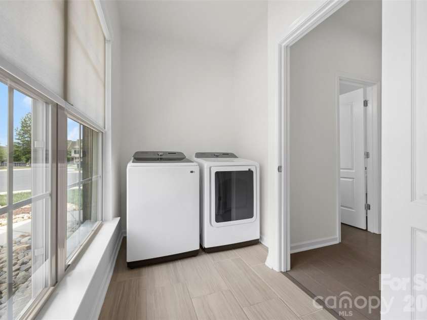 8012 Lantern Way, Fort Mill, SC 29707.  MLS# CAR4393030, YatesRealty ID 33401. Laundry room on main level