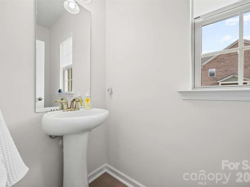 8012 Lantern Way, Fort Mill, SC 29707.  MLS# CAR4393030, YatesRealty ID 33401. Powder room on main level